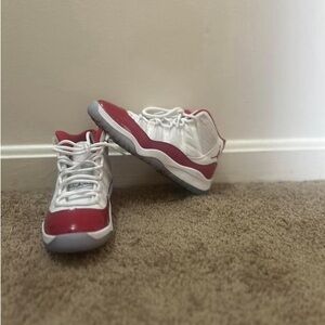 Red and white Jordan’s size 2 kids